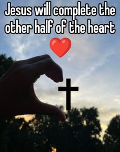 someone holding their hand up to a cross with the words jesus will complete the other half of the heart