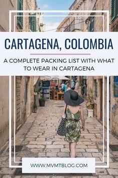 a woman walking down an alley way with the words cartagena, colombia