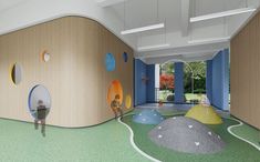 children's play area with colorful walls and flooring