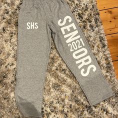 Super Soft Never Worn Gildab Sweatpants. But The Only Con Is They Have My High School Graduating Class On It. But As You Can See In The Picture The Fuzz Inside Isn’t Pilled Yet And Still Is Buttery Soft Gray Letter Print Pants For Loungewear, Stretch Pants With Letter Print For Loungewear, Stretch Letter Print Pants For Loungewear, Stretch Letter Print Loungewear Pants, Senior Sweatpants, Sweatpants Diy, Senior Apparel, Senior Pants, Senior Ideas