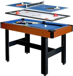 two ping pong tables are set up to play table tennis