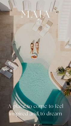 an aerial view of two people sitting at the edge of a swimming pool with text that reads, maa a place to one to feel inspired and to dream