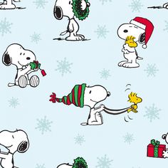 snoopy christmas wallpaper with dogs and presents on blue snowflaked background