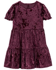 So festive, soft and on trend for winter, your girl will be holiday ready in this velour dress complete with little puff sleeves and a tiered style. Two Kids With Velvet Dress, Toddler Burgandy Dress, Velvet Christmas Dress Toddler, Toddler Winter Black Dress, Girls Velvet Dress Kids Fashion, Deep Purple Dress, Purple Velvet Dress, Plum Dress, Velour Dress