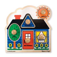 a wooden puzzle with a house on the front and two buttons in the middle that say,