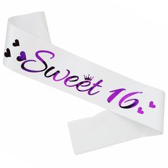 a white sign with purple writing on it that says sweet 16 and hearts in the middle