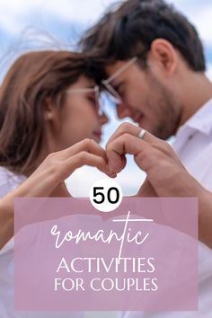 a man and woman making a heart shape with the text 50 romantic activities for couples