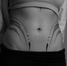 a woman's stomach with black lines on it