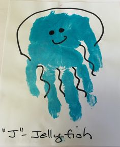 a child's drawing of a blue jellyfish