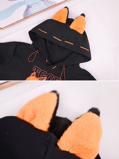 Inspired by the beloved characters Hua Cheng and Xie Lian from "Heaven Official's Blessing," this hoodie is a must-have for any fan. Featuring plush fox ears on the hood and intricate cross designs on the sleeves, this piece stands out with its unique and adorable details. The hoodie is adorned with plush fox and mink patterns, adding an extra touch of kawaii charm. Please note that the price includes one hoodie only.  Price includes one hoodie only.   	 		 			Size 			S 			M 			L 			XL Winter Cosplay Hoodie With Cartoon Print, Kawaii Cosplay Hoodie For Winter, Kawaii Winter Cosplay Hoodie, Cute Black Hoodie For Winter, Cute Black Winter Hoodie, Cute Black Winter Sweatshirt, Cute Black Sweatshirt For Winter, Black Kawaii Hoodie For Winter, Cute Black Hooded Sweatshirt