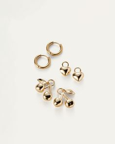 Play with the versatility of this earring kit by switching between Puffy Hearts and Cherry charms, which can be removed from a set of huggies. Remove charms for a set of water-durable, stainless steel huggies. Finished in high-polish gold. charms: 14k gold dipped brasshuggie earrings: 14K gold-plated steelhinged closurefinish: high polish product measurements:huggie earring -length: 13.8mm / 0.54"width: 15.3mm / 0.6"depth: 2.5mm / 0.1"weight: 1.26g / 0.04ozcherry charm -length: 20.2mm / 0.8"widt Girlfriend Earrings, 2024 Wishlist, Treasure Gift, Puffy Heart Charms, Earring Kit, Huggie Earring, Jenny Bird, Phone Shop, Gold Charms