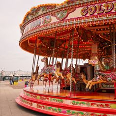 an old fashioned merry go round at the beach