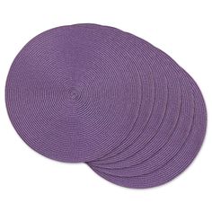 four purple placemats on white background with no one in the photo to describe