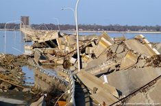 an old building that has been destroyed and is sitting in the middle of some water