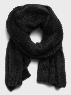 So fluffy.  This cozy scarf is knit using a fuzzy, eyelash yarn for a supersoft texture.  Length: 70" (178cm) Width: 12" (30. 5cm) Fluffy Scarf, Fuzzy Scarf, Eyelash Yarn, Cozy Scarf, Oversized Scarf, Black Scarf, Winter Wedding Dress, Blanket Scarf, Winter Wreath