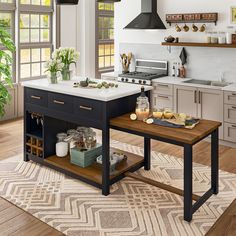 a kitchen with an island in the middle and lots of counter space on one side