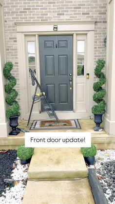 a front door with steps leading up to it and the words front door update overlay