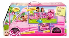 a pink toy truck with barbie dolls in it's back door and accessories inside