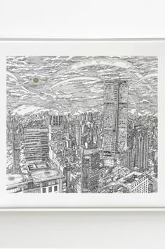 A framed architectural drawing of Tsim Sha Tsui in Hong Kong from above. The pen drawing includes some gold metallic details and is hung in a silver frame on a white background. Hong Kong Print, Peninsula Hotel, Tsim Sha Tsui, Iconic Buildings, The Masterpiece, Pen Drawing