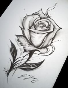 a black and white rose tattoo design on a sheet of paper with watermarking