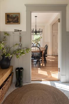 a dining room with a table and chairs in it