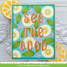 an orange card with the words see the good on it and some slices of fruit