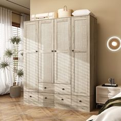 a bedroom scene with focus on the armoire and bed