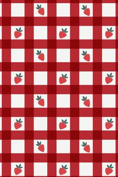 a red and white checkered table cloth with strawberries on it