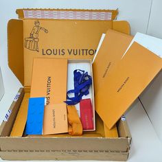 Authentic Louis Vuitton Empty Box Comes With 3 Ribbons, 2 Envelopes With Cards,Tissue Paper And Two Blank Cards. Look At The Photos For Details Louis Vuitton Gift, Louis Vuitton Gifts, Shipping Boxes, Louis Vuitton Wallet, Louis Vuitton Accessories, Gift Package, Box Bag, Vuitton Handbags, Blank Cards