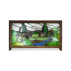 a stained glass window with trees and flowers on it's side, in the shape of a landscape