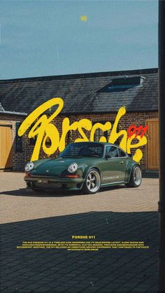 a green porsche parked in front of a brick building