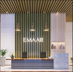 the front desk of an emaarr store with two lamps on it's side