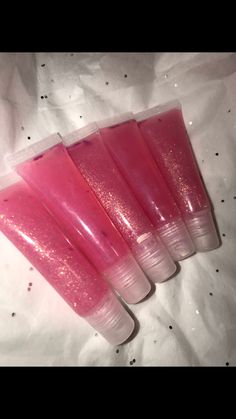 Do you want to start your own business?! Then think about buying wholesale! (Suggested Retail Price Per Tube: $5-$6) I make homemade organic lip gloss. I have recently started doing wholesale orders. I also sale lip gloss individually. Once you order wholesale, I make the lip gloss right away.  You can request a different scent and glitter or no glitter for any color. Scents Available: Vanilla, Berry, or Strawberry. You can request a different scent for $5 extra. GLOSSES: Redriguez: Sheer Red with Strawberry Scent Unicorn Blaze: Sheer Pink with berry Scent and color particles.  Connie: Sheer White with glitter and vanilla scent. Positive Pink: Non-Scented Sheer Pink Noah's Ark- Berry Scented, with glitter. Includes 4 colors. Ocean: This is a nice blue gloss with a glassy finish. Comes off White With Glitter, Strawberry Scent, No Lips, Pink Gloss, Lip Gloss Homemade, Cute Nail Polish, Vanilla Scent, Lip Hair, Start Your Own Business