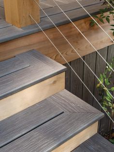 wooden steps and railings in an outdoor setting