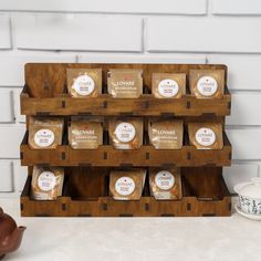 a wooden display case filled with different types of food