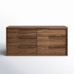 the sideboard is made from wood and has three drawers