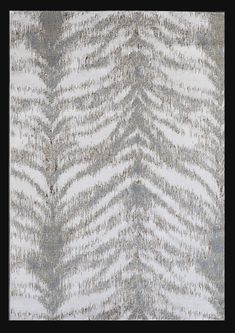 an animal print pattern is shown in grey and white