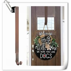 a welcome sign hanging on the front door of a house with a dog's leash attached to it