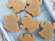 some cookies are on a cooling rack and ready to be cut into pieces or put in the oven