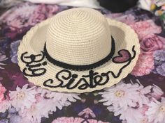 This listing is for a Baby, Toddler, and Young Girls Only To see all the listings for items in my store, you can click below: https://etsy.me/2wfDgp4 HOW TO ORDER: Choose Hat color and size And Trim Type Personalization - Sequin Color -Date needed by (IF ANY) -Personalization wording details. I will write the hat with the exact spelling and capitalization you have provided, so please triple check your selections and text before placing an order. You are more than welcome to ask any questions, I Cheap Beach Sun Hat With Letter Print, Customizable White Beach Hats, Beach Hats With Letter Print In Black, Personalized Curved Brim Beach Hat, Personalized White Beach Hat, Sequin Hat, Floppy Beach Hat, Floppy Hats, Beach Hat