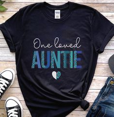 .Auntie shirt, One loved auntie of boys shirt, aunt shirt, auntie gifts, aunt life shirt, cool aunt shirt, sister auntie shirt, new auntie, Great news!, we now ship locally 9 countries including Uk and USA thanks to fulfilment Centers in these locations. *Sleeves do not come rolled. ----------------------------------------------------------  Material: 100% ringspun cotton.* - Seamless twin needle collar. - Taped neck and shoulders. - Tubular body. - Twin needle sleeves and hem. Weight:  - White 144gsm. - Colours 153gsm. *Heathers 65% cotton/35% polyester. **Sport grey and antiques 90% cotton/10% polyester. ---------------------------------------------------------- Our entire shop here  https://etsy.me/3d9lkzC  All our shirts are UNISEX, please message us if you'd like womens fitting shirts Sister Gender Reveal, Auntie And Nephew, Twin Announcement, Auntie To Be, Promoted To Auntie, Twins Announcement, Best Auntie Ever, Twin Shirts, Gender Reveal Ideas