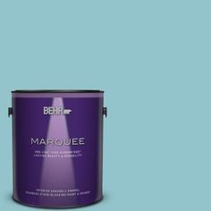 behr marquee interior paint in one gallon, with the lid open and it's base painted off