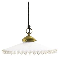 an old fashioned glass light hanging from a ceiling fixture with a black cord attached to it