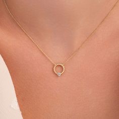 Introducing our exquisite Circle Diamond Necklace, a timeless and elegant piece that seamlessly blends sophistication with simplicity. Crafted with precision, the pendant features a brilliant 0.10-carat G SI1 diamond, radiating a stunning sparkle that captures attention effortlessly. ✨ 14k solid gold. ✨ Handpicked diamonds SI1+ clarity, G - H Color. ✨ Available lengths: 16 to 20 inches. Chain Width 1.00 mm. ✨ Diamond: 3.00mm round brilliant diamond 0,10ct. ✨ Dimensions: 12.50mm x 11.00mm x 1.80m Diamond Circle Necklace, Mangalsutra Designs, Luxury Jewelry Brands, Thoughtful Gifts For Her, Wear Necklaces, Round Necklace, Circle Diamond, Circle Necklace, Diamond Fashion