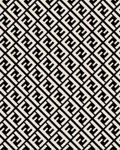 an abstract black and white pattern with intersecting lines in the center, on a dark background