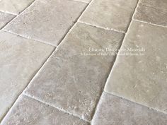 an image of a tile floor that looks like it is made out of stone or concrete