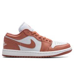 The Air Jordan 1 Low Women’s makes a statement with its premium aesthetic. This iteration has a new two-toned rendition featuring a pink hue. The sneaker has a crisp leather upper with 'Pink Salmon' overlays, including the Swoosh. The oversized tongue, mesh insoles, and rubber outsole complete the design. DUE TO THE NATURE OF THIS PRODUCT, ALL SALES ARE FINAL. THIS ITEM IS NOT ELIGIBLE FOR DISCOUNTS OR SPECIAL PROMOTIONS. Leather construction Lace-up closure Jordan branding Perforated toe box Ru Nike Jordan Low, Air Jordan 1 Low Women, Jordan 1 Low Women, Jordan 1 Lows, Premium Aesthetic, Jordan 100, Elopement Party, Pink Jordans, Jordan Low