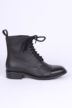 WWII 1940s-Inspired Leather Military Boots Introducing Robbie, an authentic-looking WWII 1940s-inspired leather lace-up boot. These sturdy, casual boots are crafted from full-grain structured leather and feature a rounded toe cap, a slim-fitting boot shaft, eight pairs of metal eyelets for the laces, and durable rubber outsoles. The 1,18 in high wooden heel is topped with a rubber sole for added durability. Inside, the boots have a leather insole with soft, padded silicone inserts for breathabil Classic Lace-up Boots With Reinforced Toe, Military Lace-up Leather Boots, Military Leather Combat Boots With Round Toe, Military Lace-up Boots With Reinforced Toe, Military Black Work Boots With Reinforced Toe, Mens Military Boots, 1930s Shoes, 1950s Shoes, 1920s Shoes