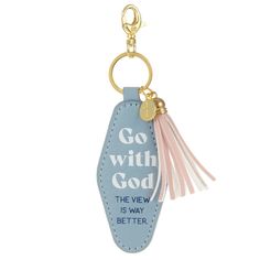 With plenty of room for a variety of keys, this ogee-shaped keychain makes a perfect gift for birthdays, Mother's Day, graduation and more. Metal ring with blue faux leather fob featuring an inspirational message, a pink faux leather tassel and a gold metal charm with debossed cross design will keep you moving forward and on course during all your daily travels. | Keychain features a metal ring with blue fob and pink tassel in faux leather, a gold metal cross charm and lobster clasp. | On key fob: Go with God. The view is way better. | Makes a great gift for a friend or loved one. | Simulated leather and metal. | 1.6'' W x 5.5'' H x 0.375'' D Keychains Preppy, Jesus Keychain, Keychain Design Ideas, Preppy Keychain, Go With God, Christian Singleness, Bible Accessories, Study Craft, School Wishlist