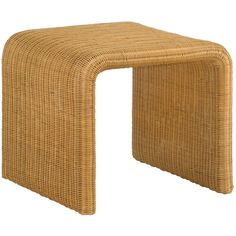 a small wicker stool made out of wood